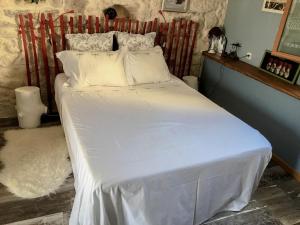 Postel nebo postele na pokoji v ubytování Le Duplex de Lapparan