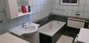 Kúpeľňa v ubytovaní Apartman Max