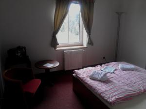 Postel nebo postele na pokoji v ubytování Hotel Bellevue + 14 fotografií