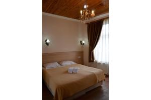 Un pat sau paturi într-o cameră la Piya Hostel