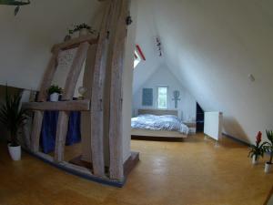 a bedroom with a bed in a attic at Ferienwohnung Regina in Albstadt