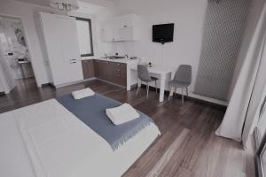 Et tv og/eller underholdning på City Center Premium Apartments