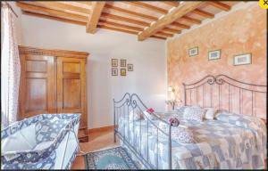 Postel nebo postele na pokoji v ubytování Bio Agriturismo Il Cavone