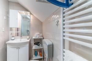 Koupelna v ubytování TOP Apartman + 9 fotografií