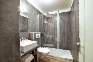 Ванная комната в Logis- Hôtel de la Baie de Wissant & Appartements
