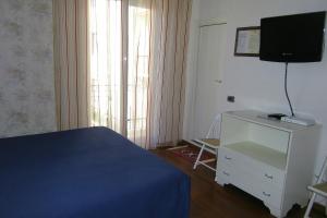 TV a/nebo společenská místnost v ubytování Hotel Galassi
