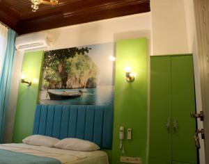 Postel nebo postele na pokoji v ubytování HOTEL MİKLAGORD