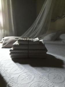 Postel nebo postele na pokoji v ubytování Piccola Corte Antica