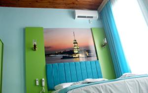 Postel nebo postele na pokoji v ubytování HOTEL MİKLAGORD