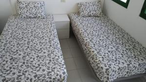 Posteľ alebo postele v izbe v ubytovaní Bungalow Dunas&Sea Maspalomas