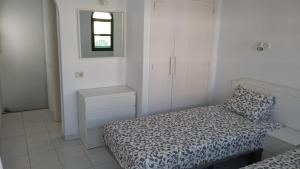 Posteľ alebo postele v izbe v ubytovaní Bungalow Dunas&Sea Maspalomas