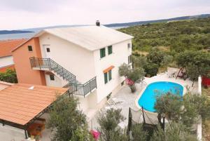 an aerial view of a house and a swimming pool at Mirta in Kastel Novi +31 photos