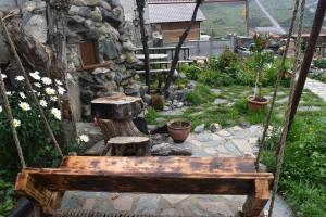 A garden outside Qusha Guesthouse Meeting in the mountains and views