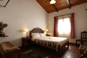 Ένα ή περισσότερα κρεβάτια σε δωμάτιο στο Posta del Sol