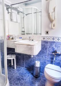 Koupelna v ubytování Hotel Castellano I