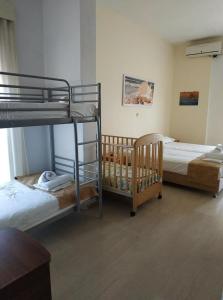 Postel nebo postele na pokoji v ubytování Aquarius Hotel
