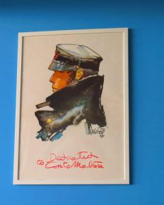 a framed picture of a pair of boots at Casa Lea in Ventimiglia