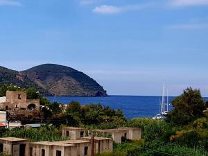 a view of a body of water with a mountain at Casa Sabrina in Lipari