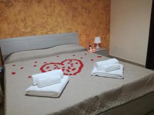 A bed or beds in a room at Porta Garibaldi