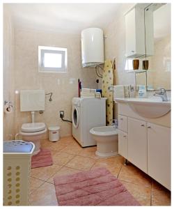 Koupelna v ubytování Apartmani Petra + 35 fotografií