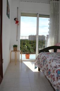Postel nebo postele na pokoji v ubytování Apartament La Vista Bonica