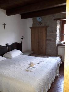 Postel nebo postele na pokoji v ubytování B&b ldl Amatrice