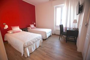 Кровать или кровати в номере A Due Passi Guest House