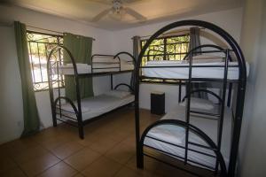 Postel nebo postele na pokoji v ubytování Wipeout Hostel