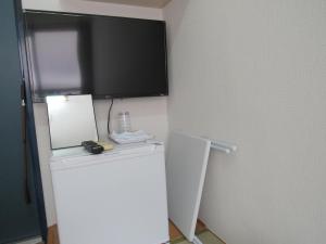Kuchyň nebo kuchyňský kout v ubytování Hotel Mirai