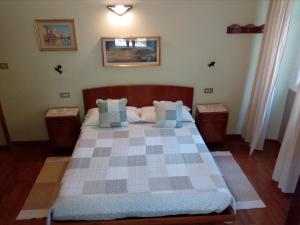 A bed or beds in a room at Albergo Milano 1920