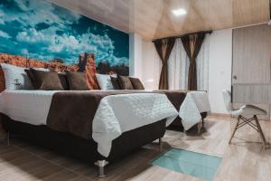 Voodi või voodid majutusasutuse HOTEl PACHAMAMA SPA toas