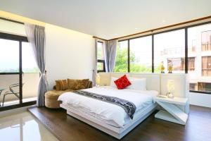 Katil atau katil-katil dalam bilik di Sakura Love River Bed and Breakfast