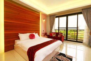 Katil atau katil-katil dalam bilik di Sakura Love River Bed and Breakfast