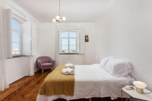 Кровать или кровати в номере Formosa Guest House