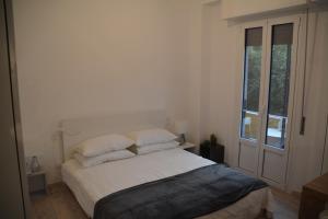 A bed or beds in a room at Maison SAGM&C