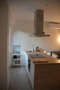 A kitchen or kitchenette at Maison SAGM&C