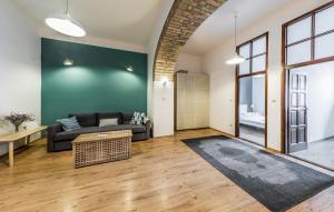 a living room with a couch and a table at French Touch Apartment with Free Parking in Budapest