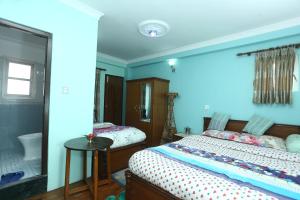 Letto o letti in una camera di Delights Home