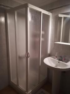 a bathroom with a shower and a sink at Brisamarina de Órzola in Orzola