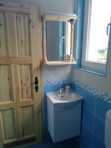 a bathroom with a sink and a mirror at Two Angels in Bled