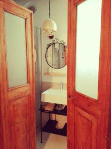 a bathroom with a sink and a mirror at Tambien B&B in Pesaro +38 photos
