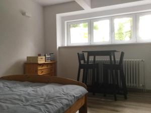 A bed or beds in a room at Vila Horec, Vysne Hagy