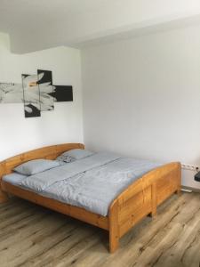 A bed or beds in a room at Vila Horec, Vysne Hagy