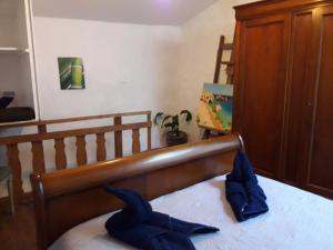 En eller flere senge i et værelse på Fleur des îles