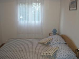 Posteľ alebo postele v izbe v ubytovaní Apartments Baric