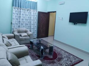 Ruang duduk di Dar ALHamra Inn