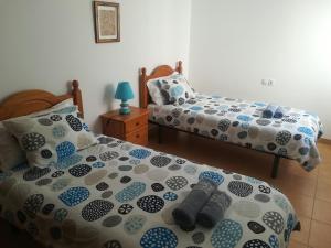 Postel nebo postele na pokoji v ubytování Odamar de Orzola