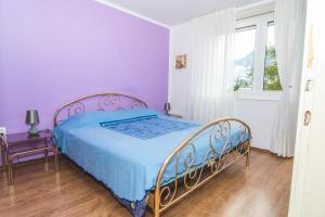 Katil atau katil-katil dalam bilik di Apartma Sonček