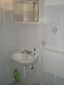 Kúpeľňa v ubytovaní Apartments Baric