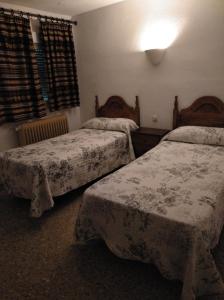 Postel nebo postele na pokoji v ubytování Pensión Rural Arroyo la Teja